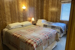 Cabin 7 queen and twin bed bedroom
